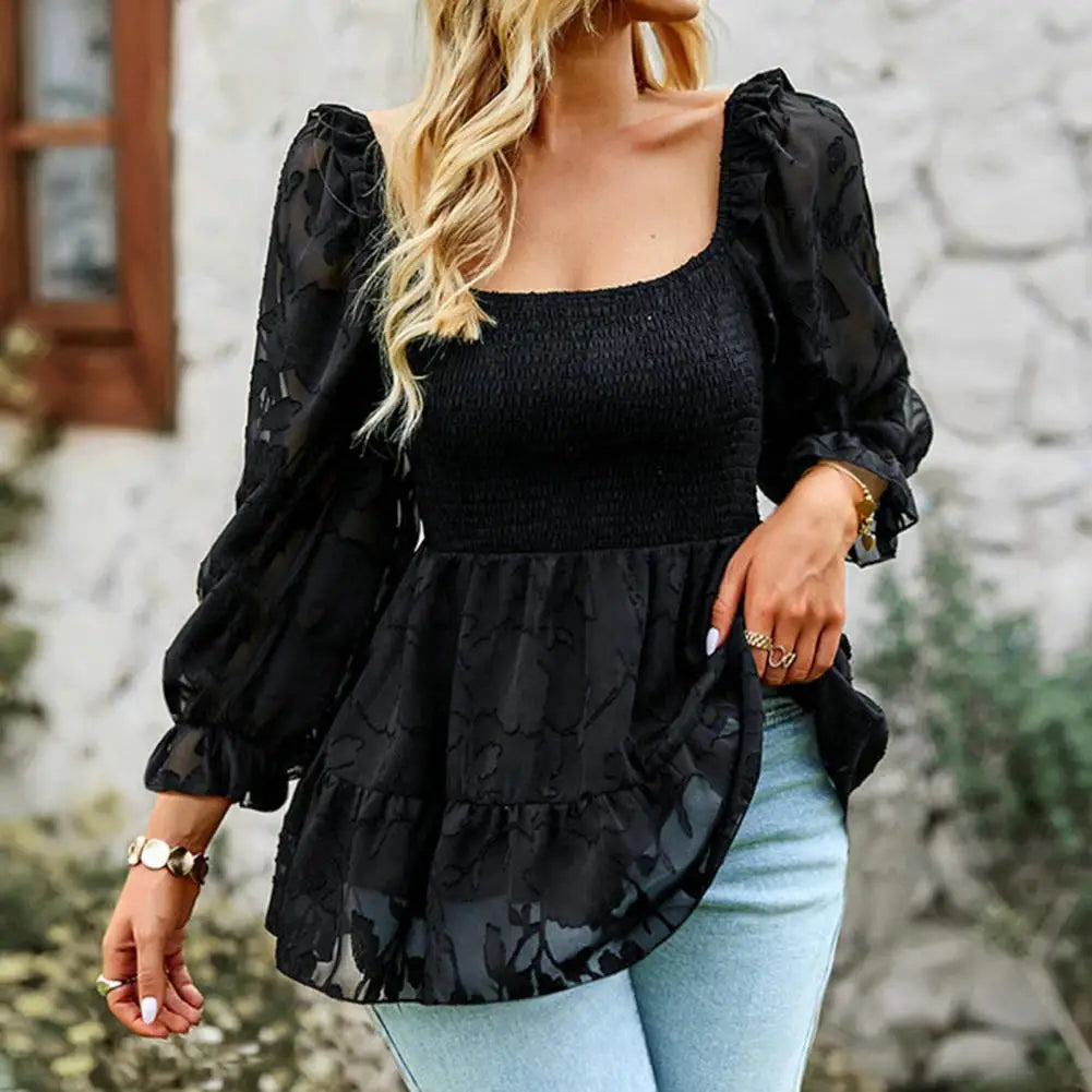 Ruffled blouse with a square neckline and sheer sleeves