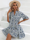 Printed mid-length dress with flared sleeves