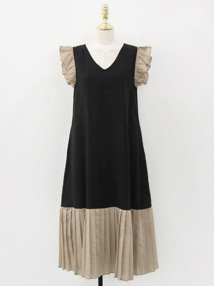 Pleated dress with V-neck and contrasting inserts