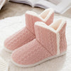 Knitted slippers with faux fur and soft sole