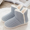 Knitted slippers with faux fur and soft sole