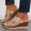 Sandals with wedge heel and rhinestones