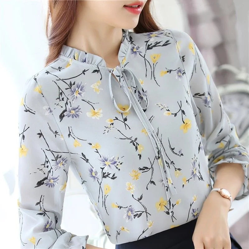 Chiffon blouse with floral pattern and bow collar