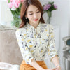 Chiffon blouse with floral pattern and bow collar