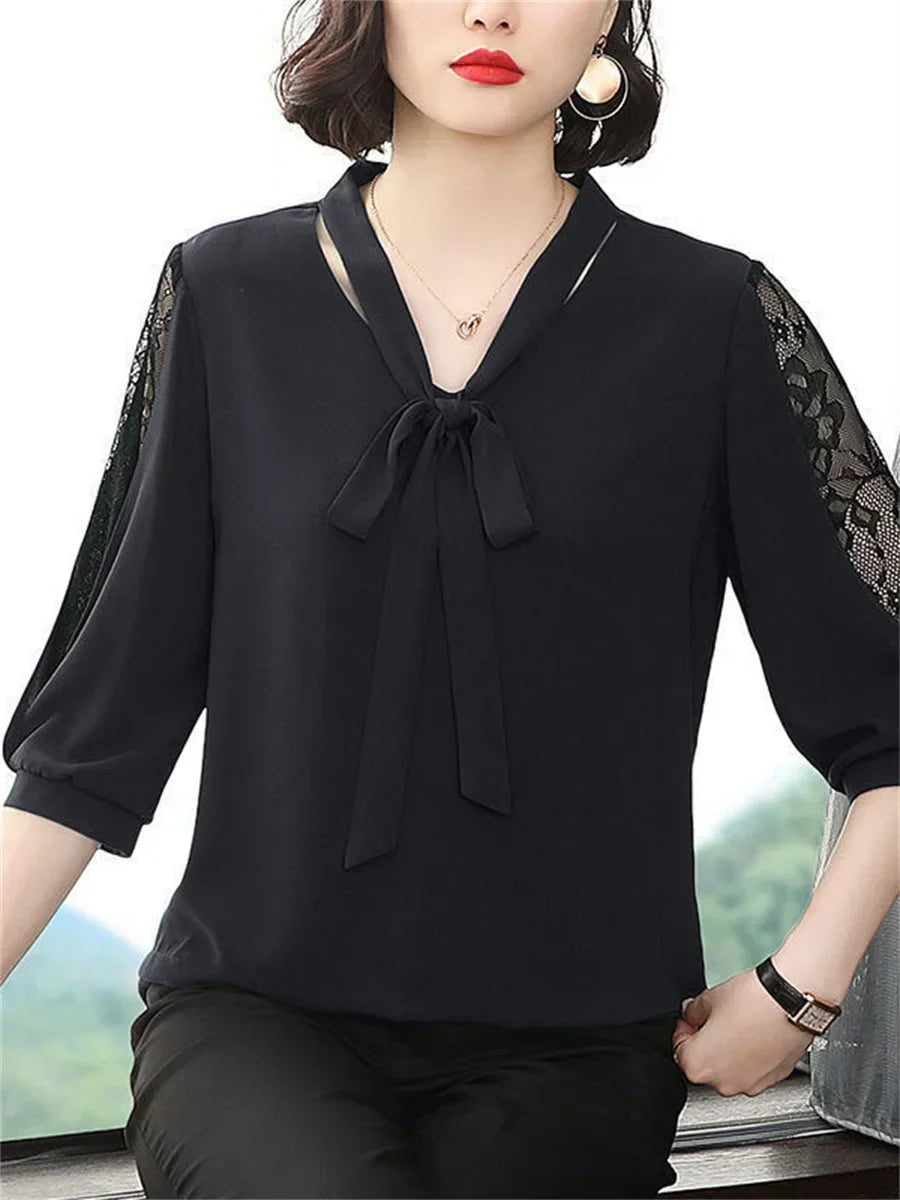 Blouse with bow collar and lace sleeves