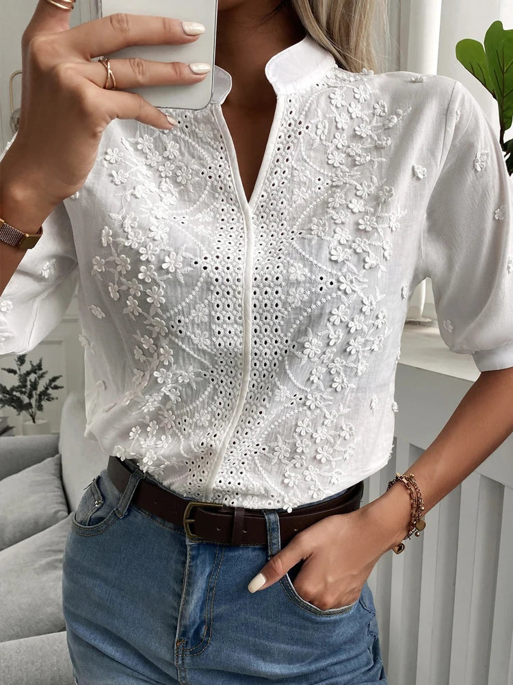 Summery blouse with floral embroidery and lace