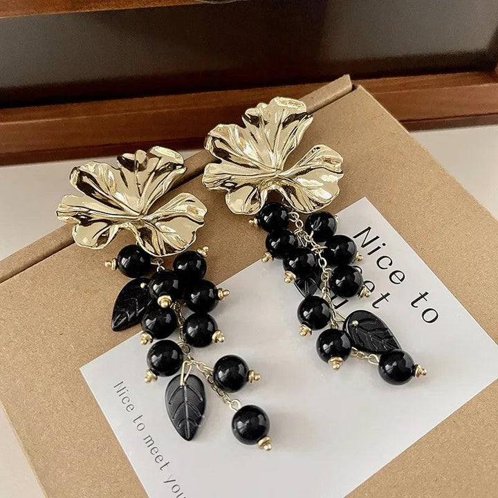 Elegant floral statement earrings with pearl cascade