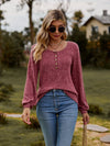 Long-sleeved jumper with button placket