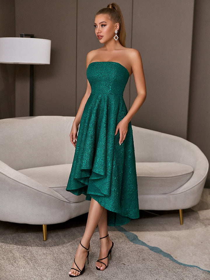 Green sleeveless elegant flared party dress with bare upper body