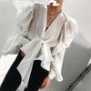 White long blouse with V-neck