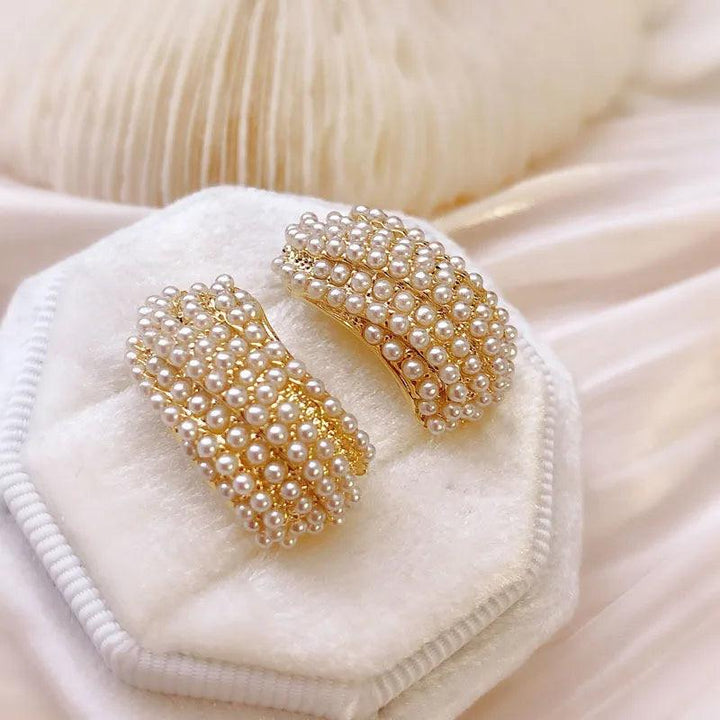 Chic earrings with pearl embellishment