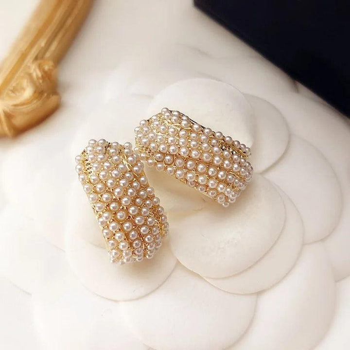 Chic earrings with pearl embellishment