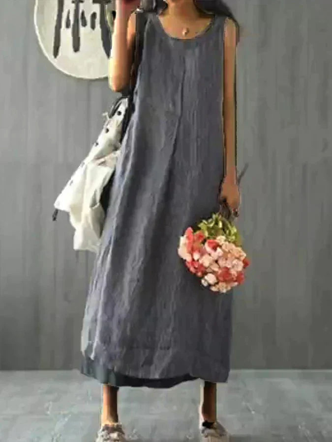 Loose, sleeveless cotton linen dress with a round neckline