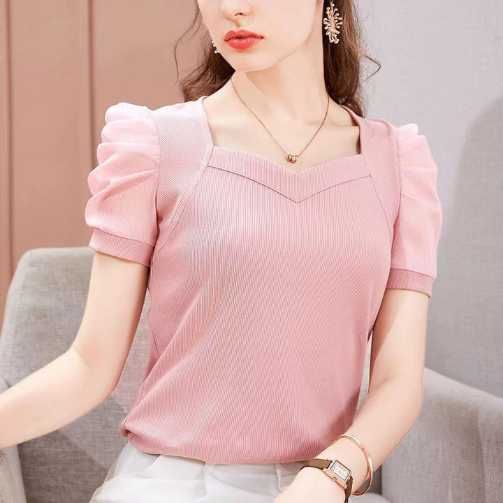 Blouse top with short puff sleeves and square neckline