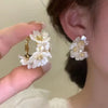 Flower hoop earrings with crystal centres