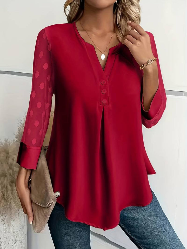 Knitted blouse with V-neck and button placket