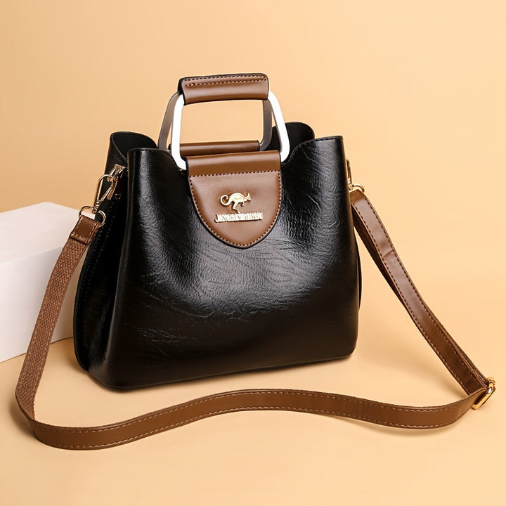 Elegant two-coloured leather bag