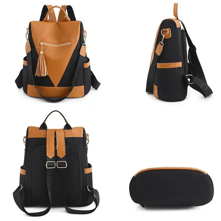 Backpack in two-colour look with tassel pendant