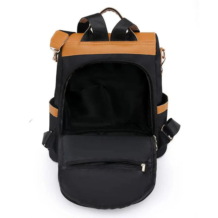 Backpack in two-colour look with tassel pendant