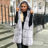 Hooded waistcoat with faux fur