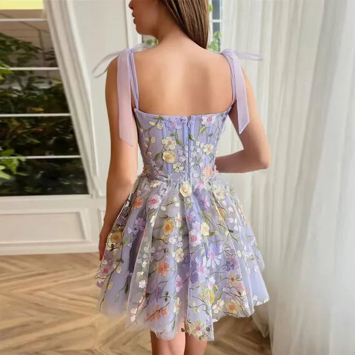 Tulle cocktail dress with floral appliqués