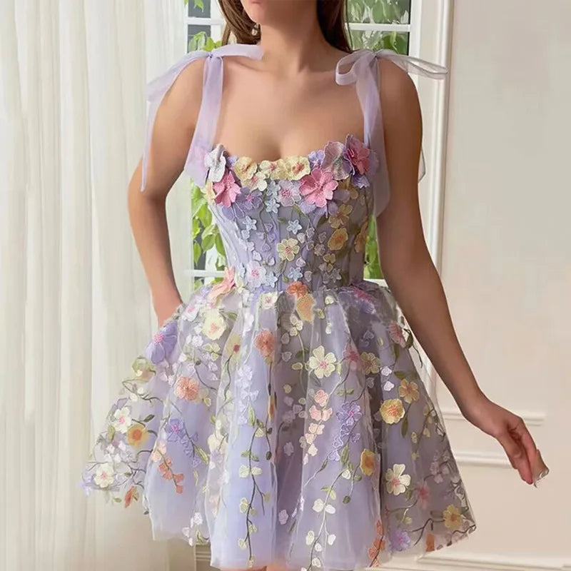 Tulle cocktail dress with floral appliqués