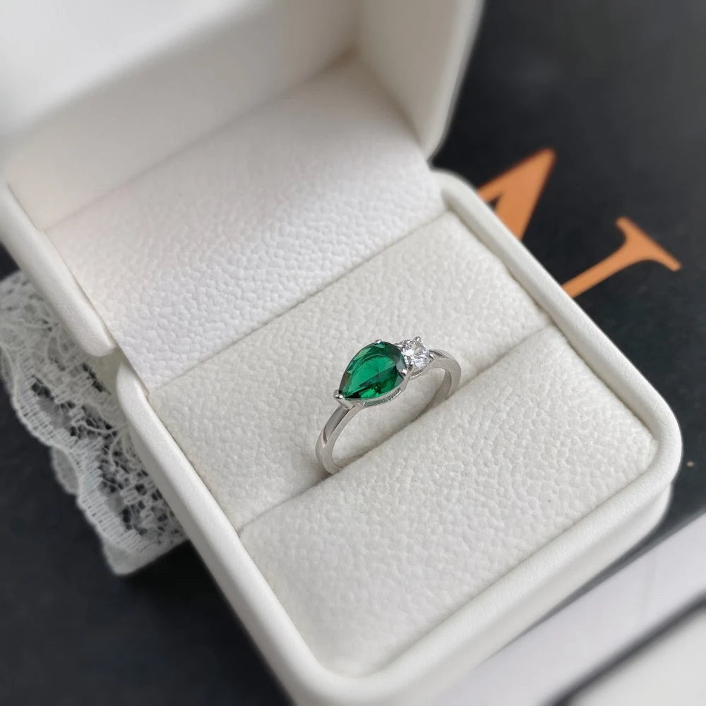 Slim ring with double gemstone design