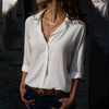 Women's blouse with V-neck and white button placket