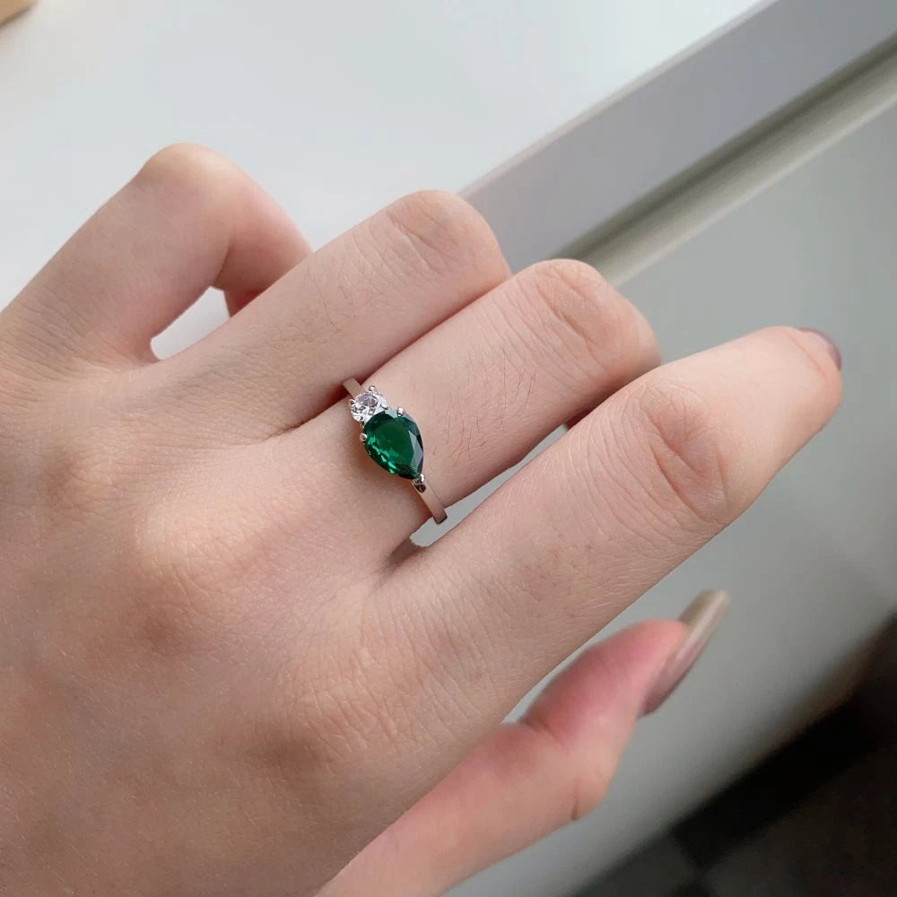 Slim ring with double gemstone design