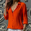 Women's blouse with V-neck and white button placket