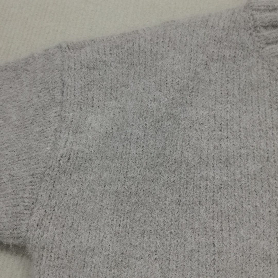 Oversized knitted jumper with pocket