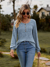 Long-sleeved jumper with button placket