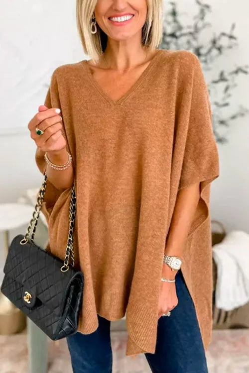 Jumper with irregular hem and V-neckline