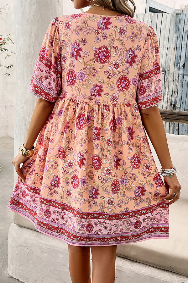 Mini dress with V-neck and floral print