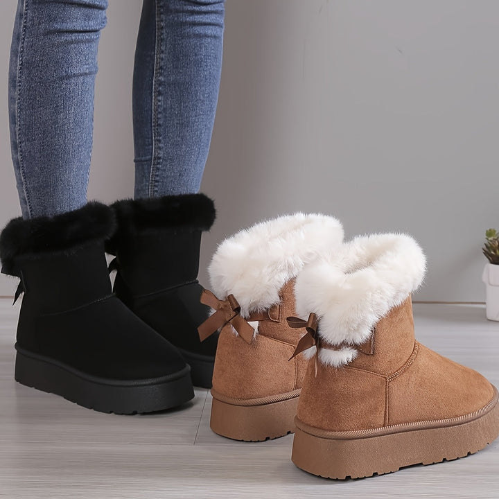 Stylish, thermo-lined plush boots with bow knot