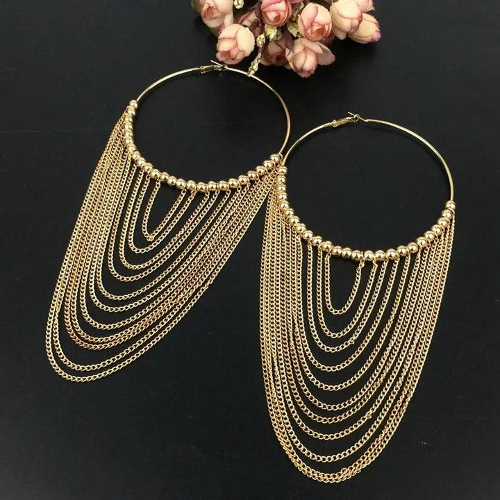 Elegant hoop earrings with pearl tassels