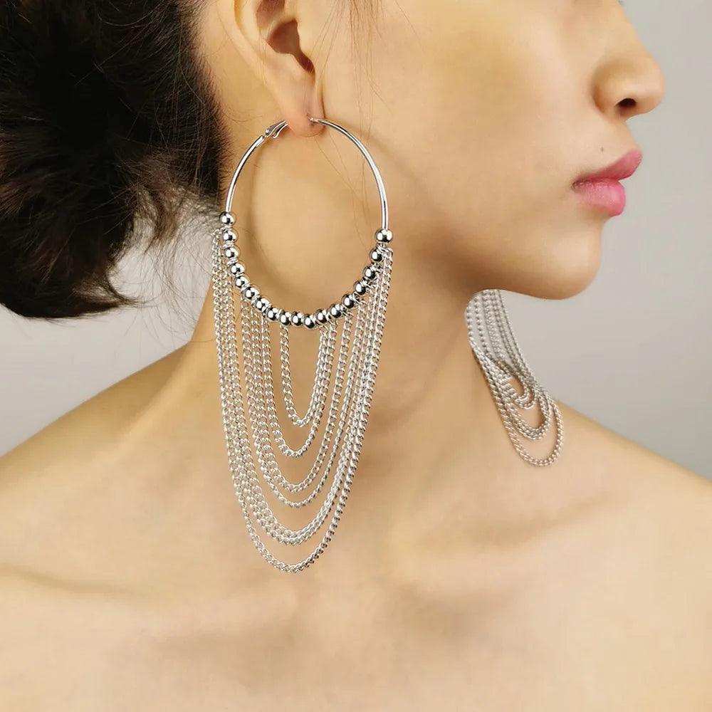 Elegant hoop earrings with pearl tassels