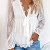 Lace blouse with deep V-neckline