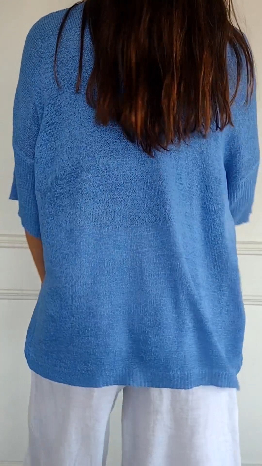 Knitted top with V-neckline