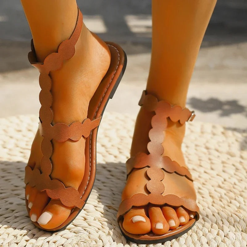 Sandals with scalloped edges