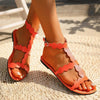 Sandals with scalloped edges