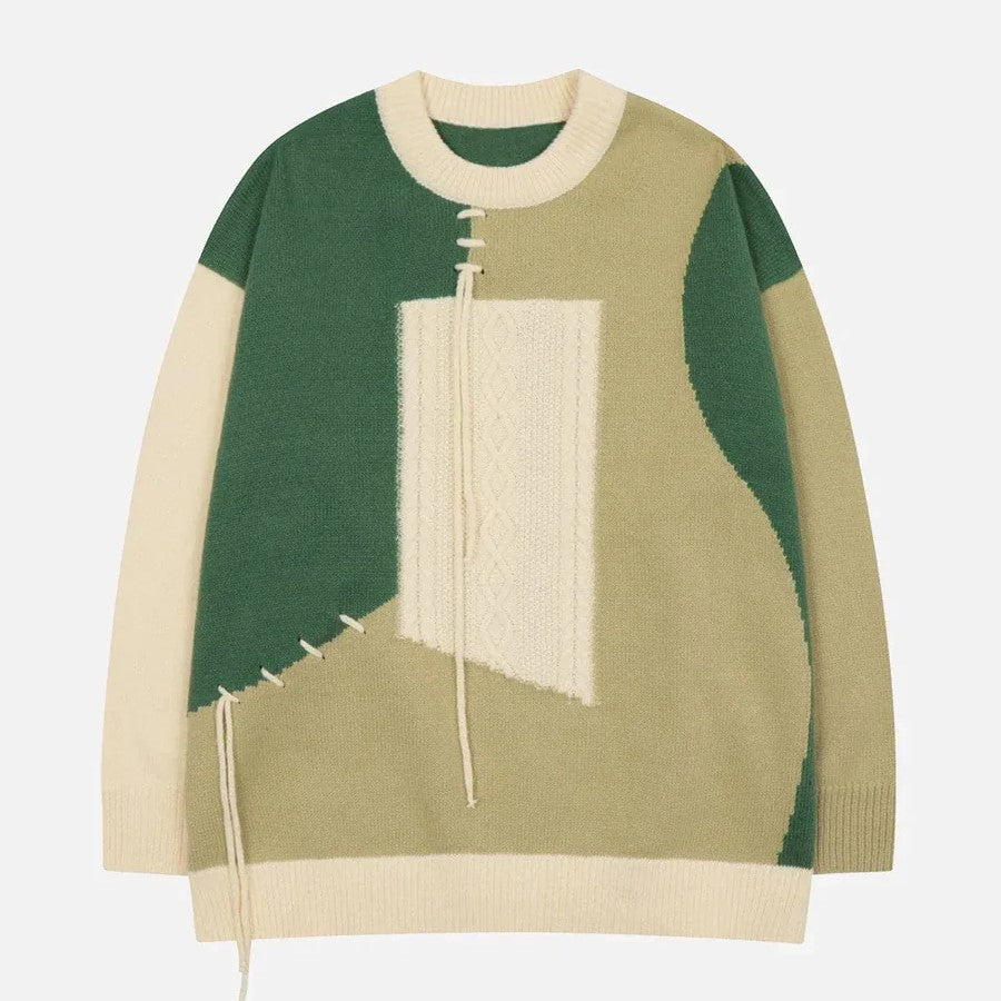 Abstract colour block jumper with cable knit detail