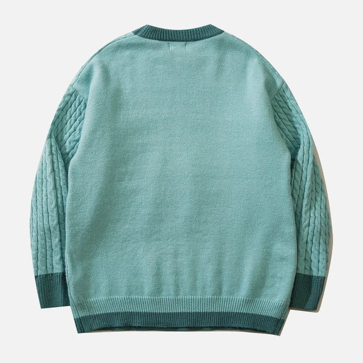 Cable knit jumper with pastel cloud motif