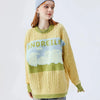 Cable knit jumper with pastel cloud motif