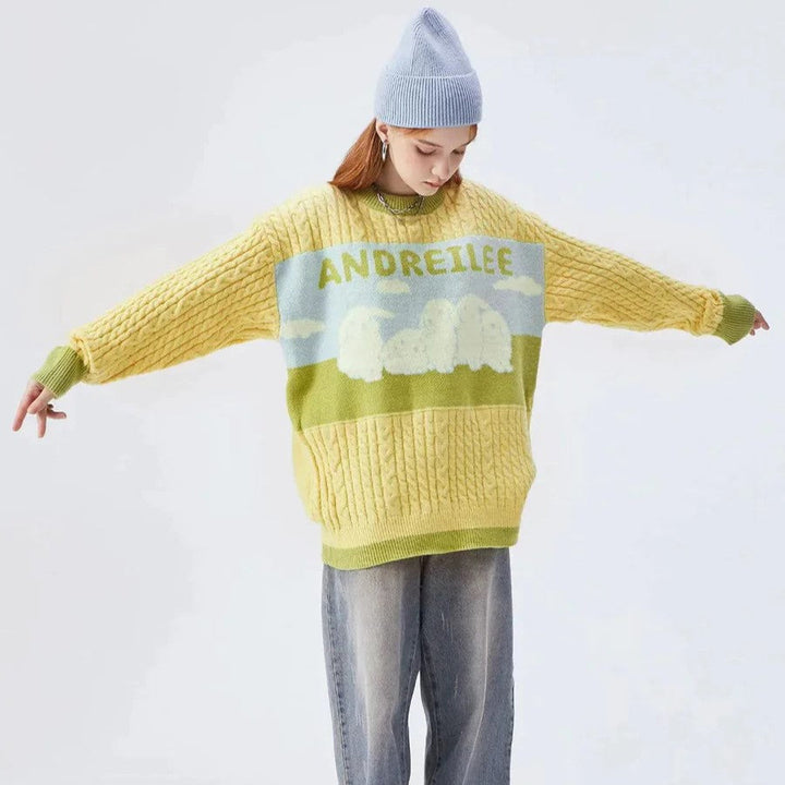 Cable knit jumper with pastel cloud motif