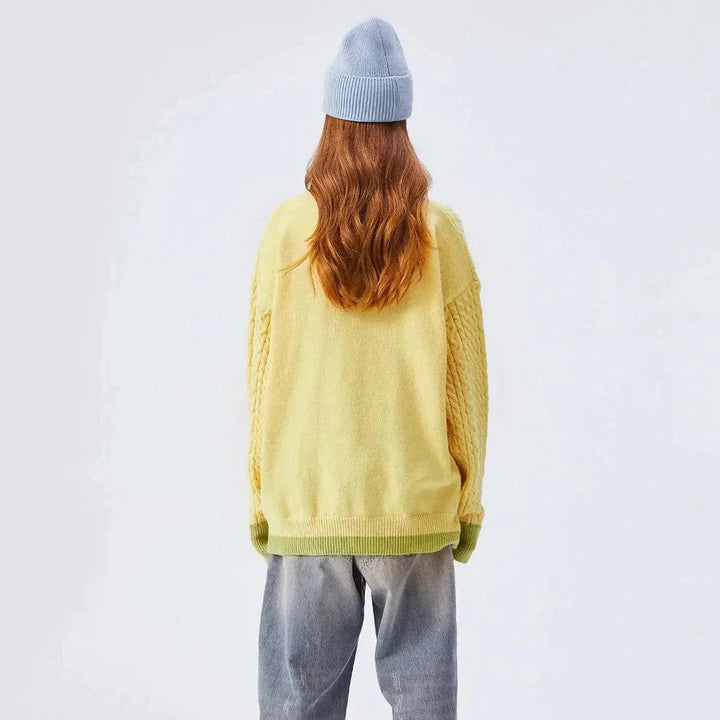 Cable knit jumper with pastel cloud motif