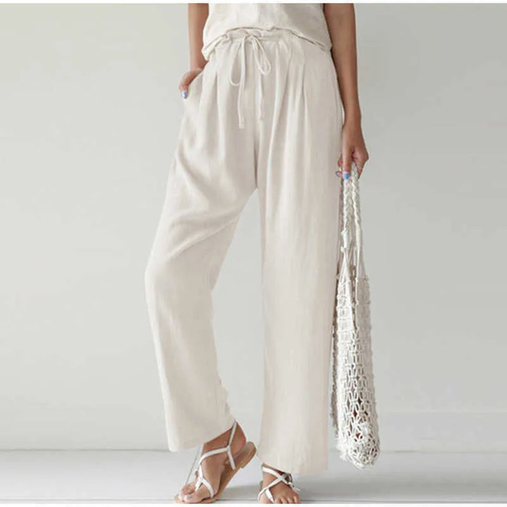 Elasticated waist Pleated front pocket Wide leg casual trousers