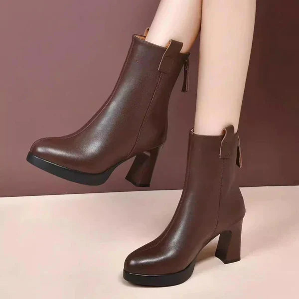 Stylish high-heeled boots with pointed toe