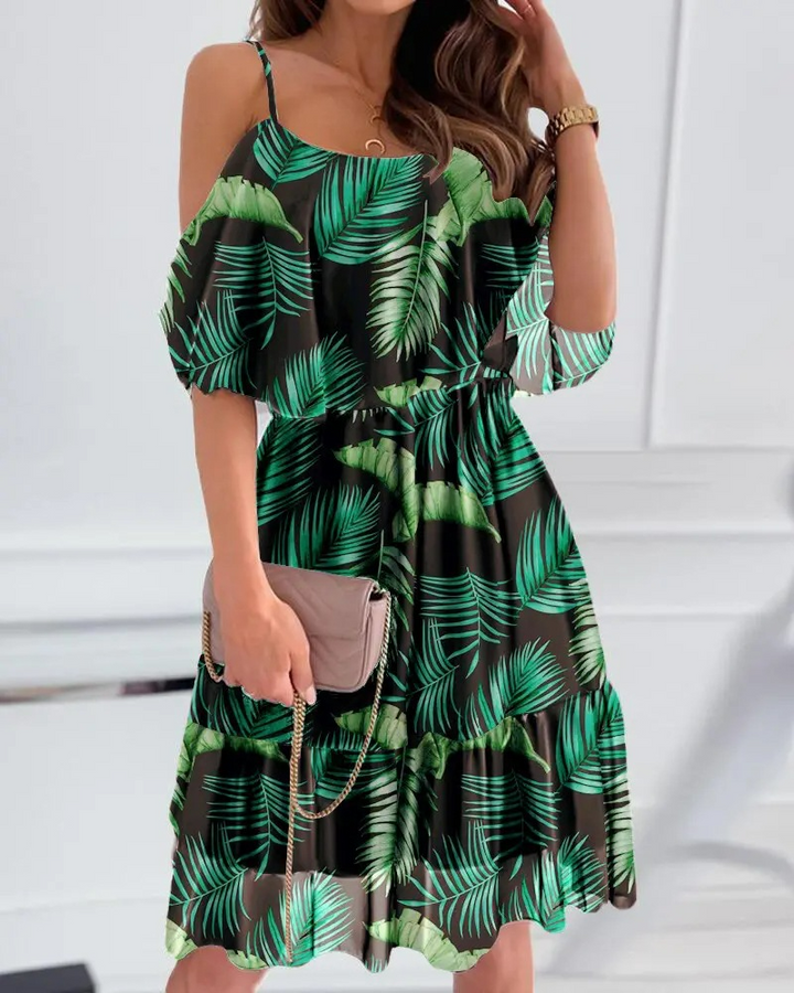 Dress with open shoulders and floral print