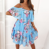 Dress with open shoulders and floral print